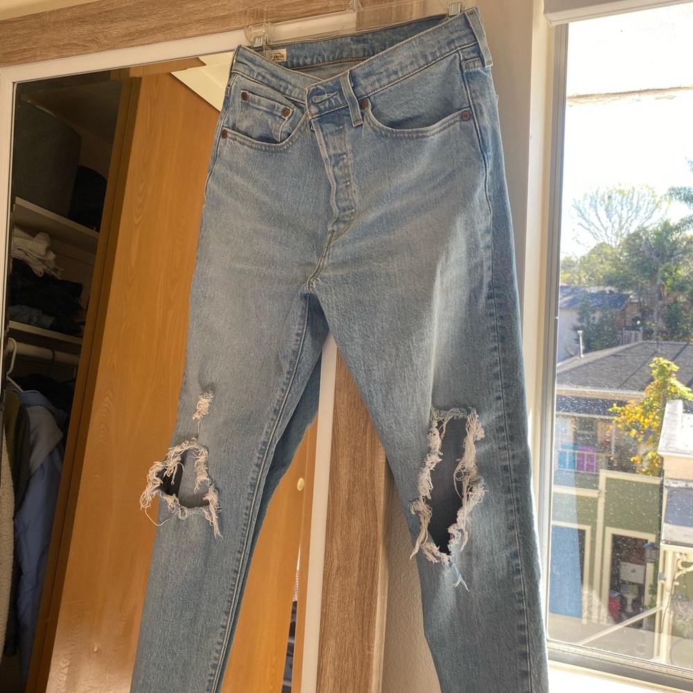 Levi’s light wash jeans.